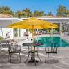 imageVINGLI Outdoor Bar Table Cast Aluminum Bar Height Patio Table with Umbrella Hole Patio Dining Table Tall Bistro Table Outdoor Furniture for Garden Porch Yard and Balcony 32quot Dia x 41 H BronzeBronze