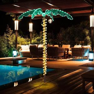 imageVINGLI 4FT Lighted Palm Tree Christmas Tree Outdoor for Outside Patio Pool Yard Holiday Decor Artificial Light up with Lifelike Leaves and Rope LEDs5FT